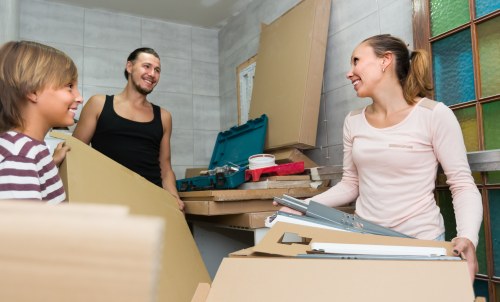 Local removals team preparing boxes and furniture for a St Giles move