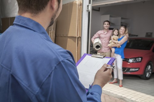 Packed boxes and workspace items ready for local business relocation