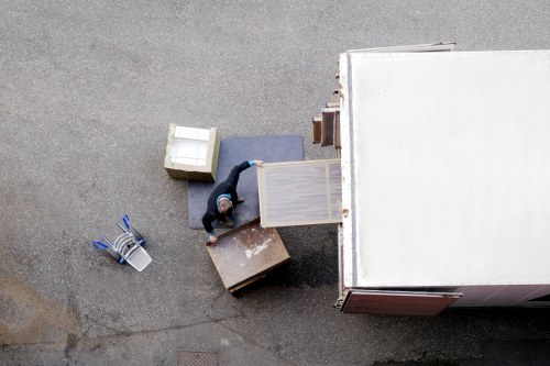 Cubic-yard rates shown for a larger household removal