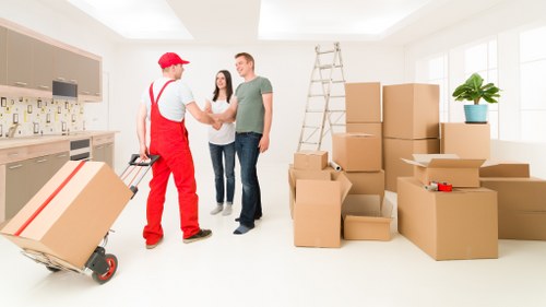 Careful unpacking of boxes in a St Giles property