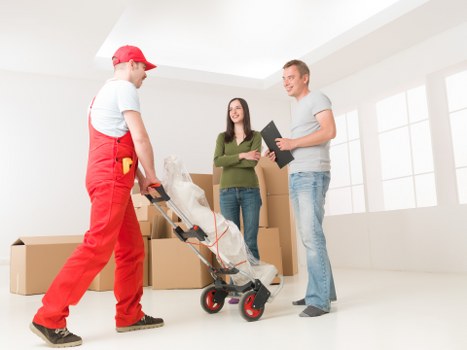 Prepared moving boxes and household items ready for relocation in St Giles