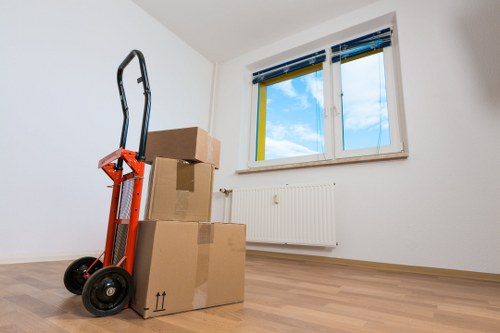 Van moving team assessing a property access route