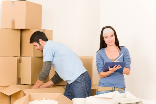 Movers unloading household items at a St Giles property