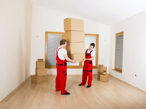 Local movers organizing packing supplies for a St Giles relocation